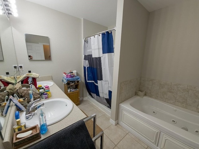 bathroom featuring tile patterned flooring, vanity, and shower with separate bathtub