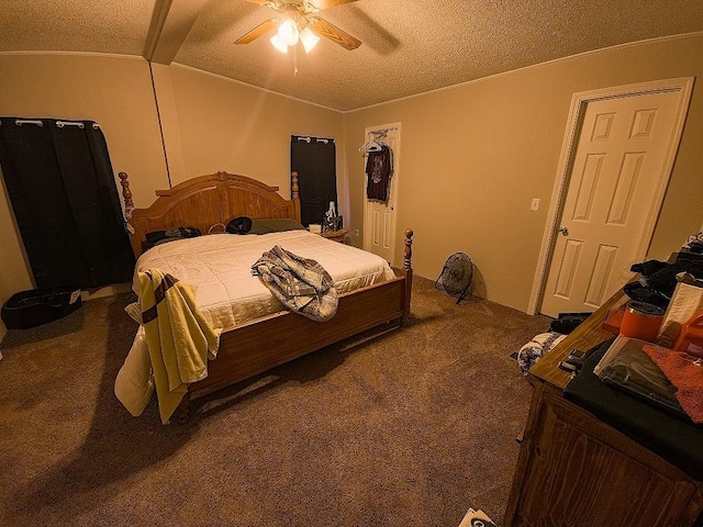 carpeted bedroom with a textured ceiling, a closet, ceiling fan, and lofted ceiling