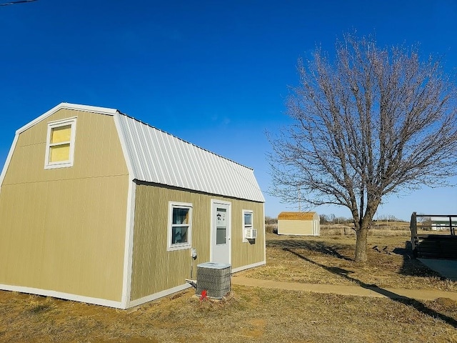 view of outdoor structure with central AC