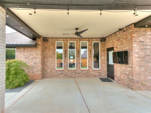 view of patio featuring ceiling fan