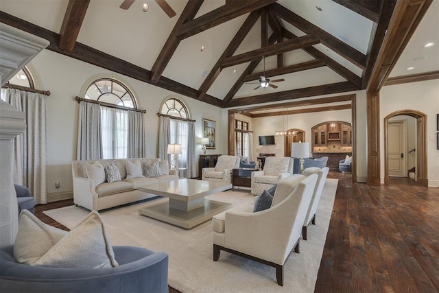 living room featuring beam ceiling, ceiling fan, high vaulted ceiling, and wood-type flooring