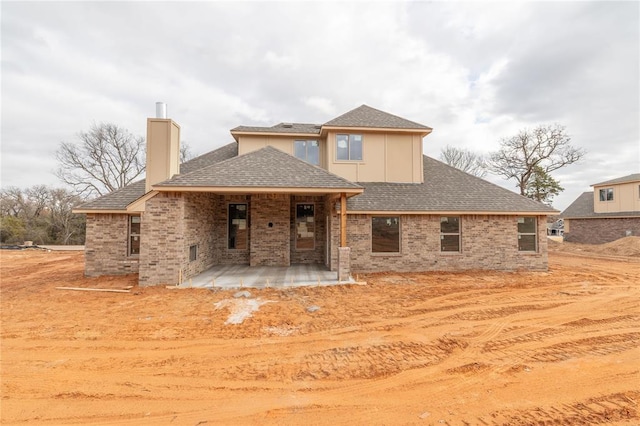 view of front of property with a patio