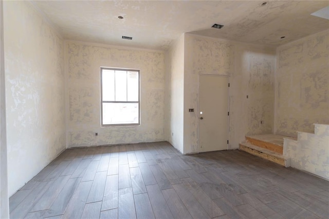 empty room with light hardwood / wood-style floors