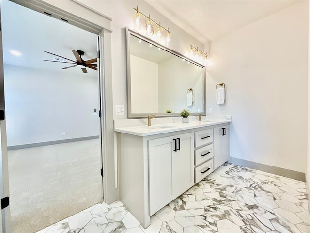 bathroom with ceiling fan and vanity