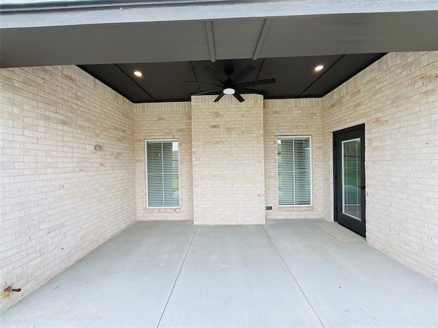 view of patio featuring ceiling fan