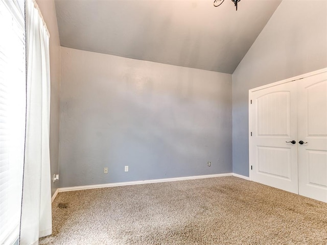 3393 Creek View Ct, Newcastle, OK 73065 - unfurnished bedroom featuring vaulted ceiling, carpet floors, baseboards, and a closet