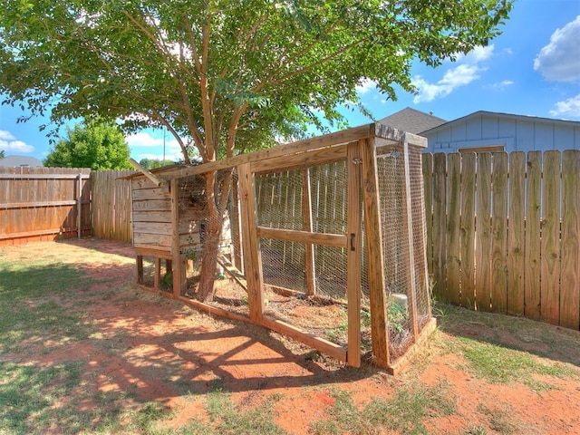 3393 Creek View Ct, Newcastle, OK 73065 - fenced backyard featuring exterior structure and an outbuilding