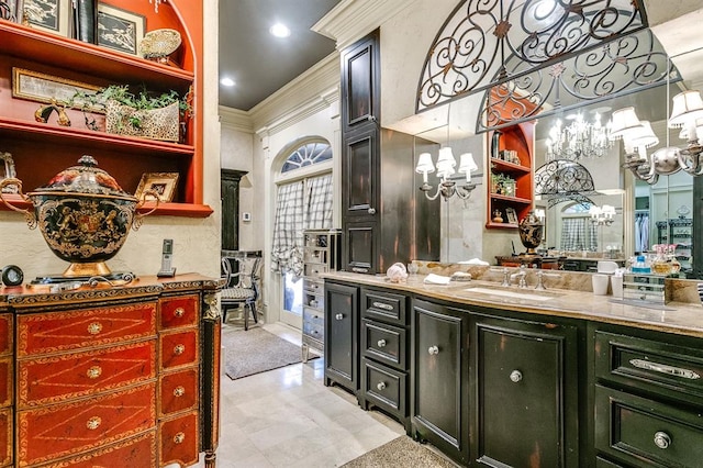 bathroom with vanity and crown molding