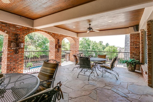 view of patio / terrace featuring ceiling fan