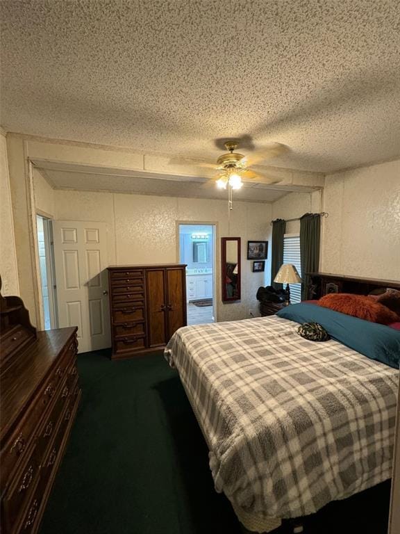 carpeted bedroom featuring ceiling fan and a textured ceiling