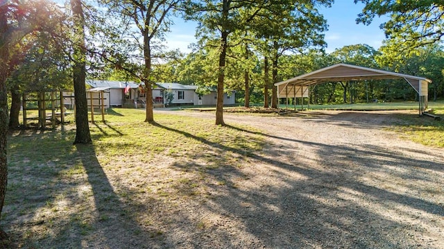 view of yard featuring a carport