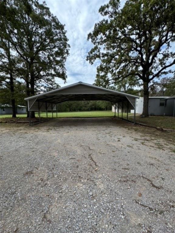 exterior space with a carport