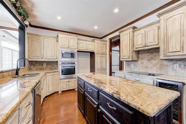 kitchen featuring sink, wine cooler, light stone countertops, appliances with stainless steel finishes, and dark brown cabinets