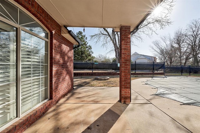 view of patio featuring an outdoor fire pit