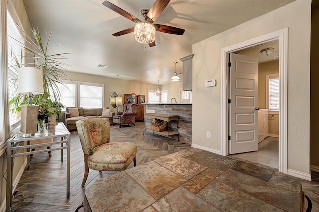 living room featuring ceiling fan