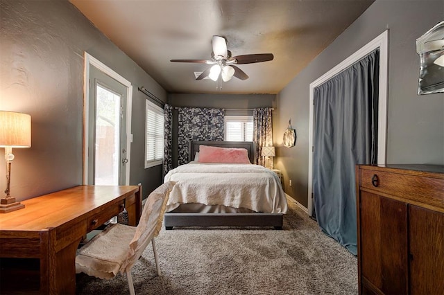 bedroom with carpet flooring, ceiling fan, and access to exterior