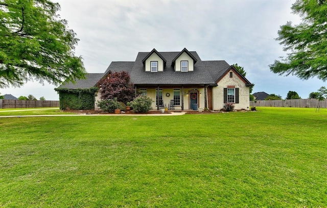 view of front of house with a front lawn and a porch