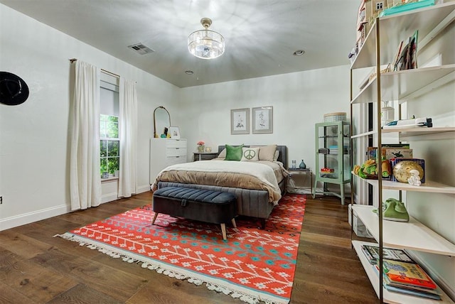 bedroom featuring dark hardwood / wood-style flooring