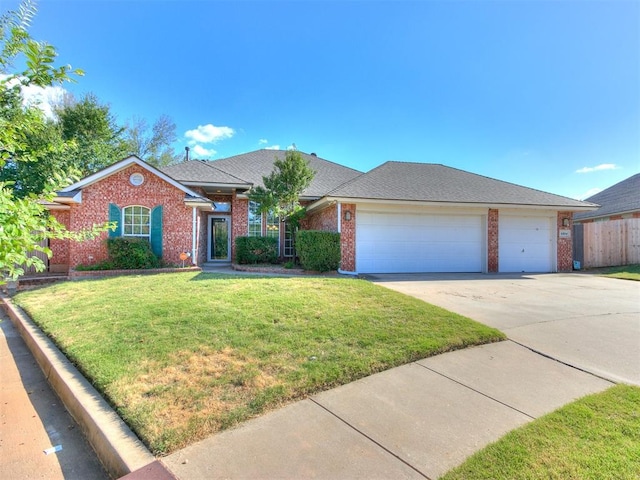 ranch-style home featuring a front yard and a garage