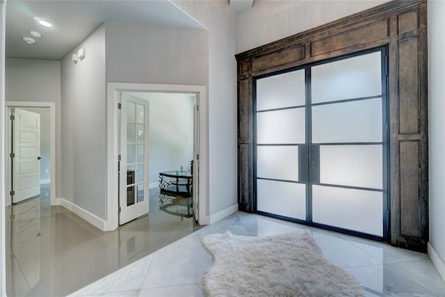 entrance foyer featuring french doors