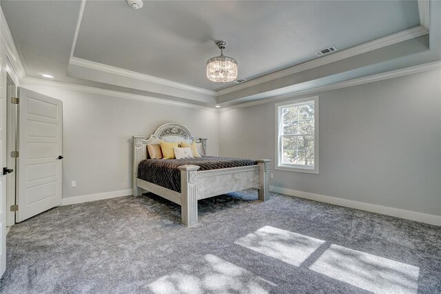 carpeted bedroom featuring a notable chandelier, a raised ceiling, and crown molding