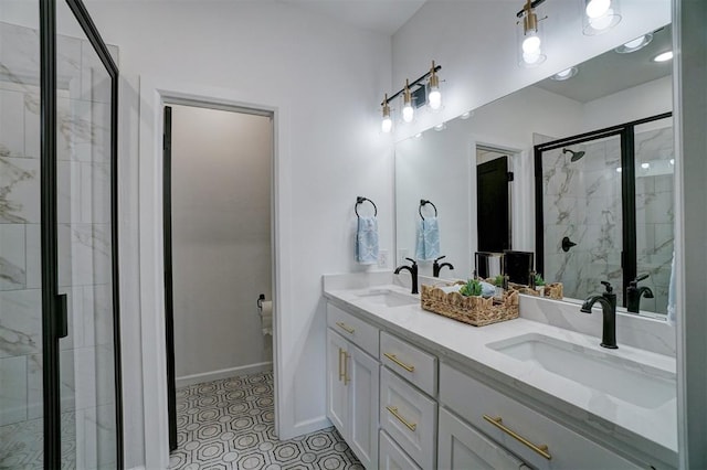 bathroom with vanity, tile patterned floors, and walk in shower