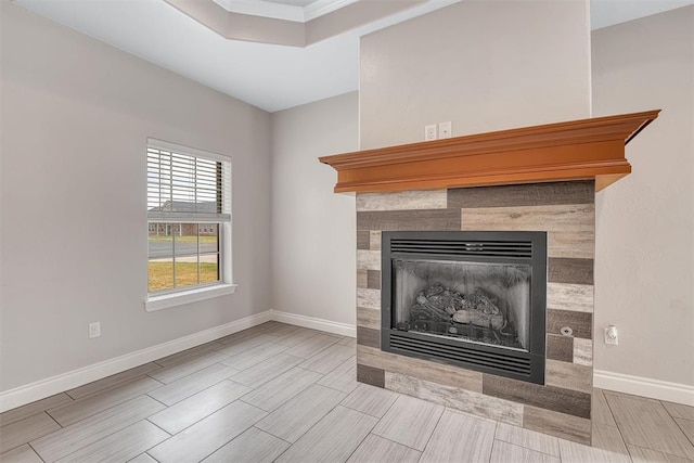 interior details with a tiled fireplace