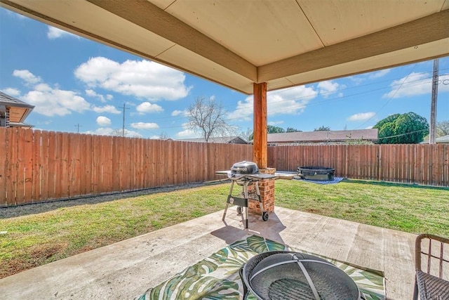 view of patio / terrace featuring a fire pit