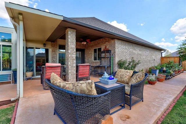 view of patio / terrace with exterior bar and an outdoor hangout area