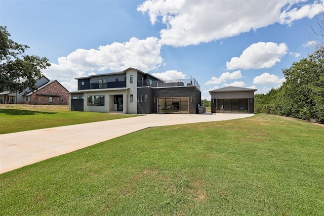 contemporary home featuring a front lawn