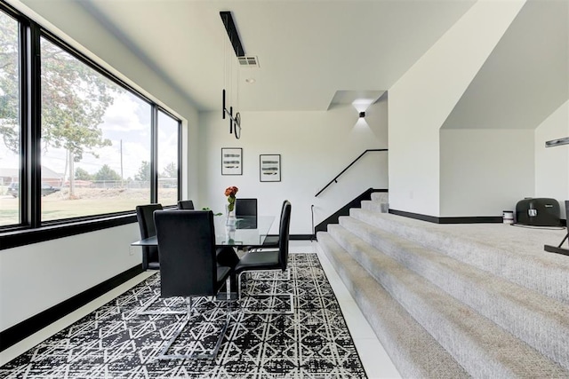 dining area featuring tile patterned floors