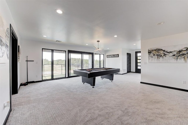 recreation room featuring light colored carpet, ceiling fan, and pool table