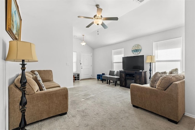 living room with carpet floors, baseboards, a ceiling fan, and lofted ceiling