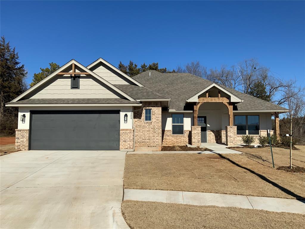 craftsman house with a garage