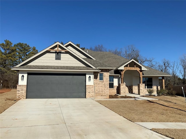 craftsman inspired home with a garage