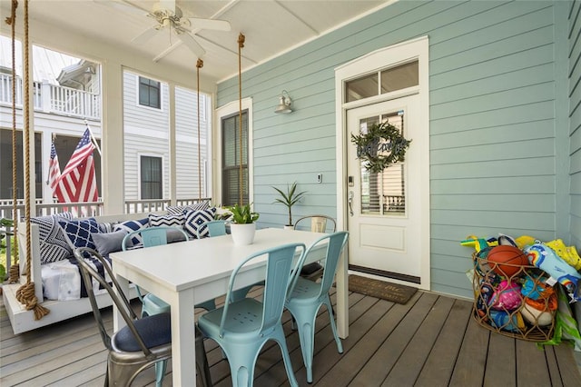 wooden terrace with ceiling fan