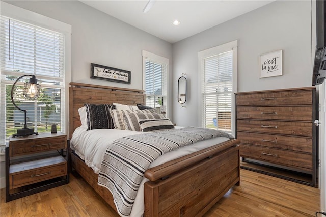 bedroom with light hardwood / wood-style flooring