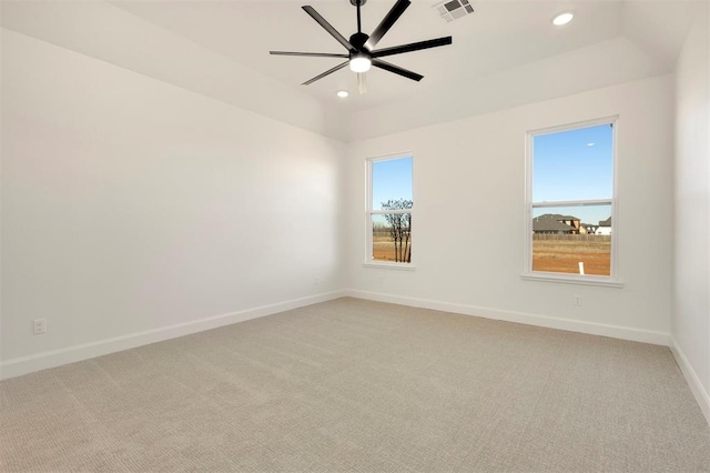 unfurnished room featuring light carpet, visible vents, recessed lighting, and baseboards