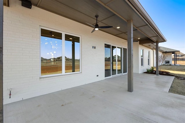 view of patio / terrace featuring ceiling fan