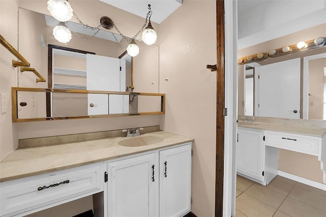 bathroom featuring tile patterned floors and vanity