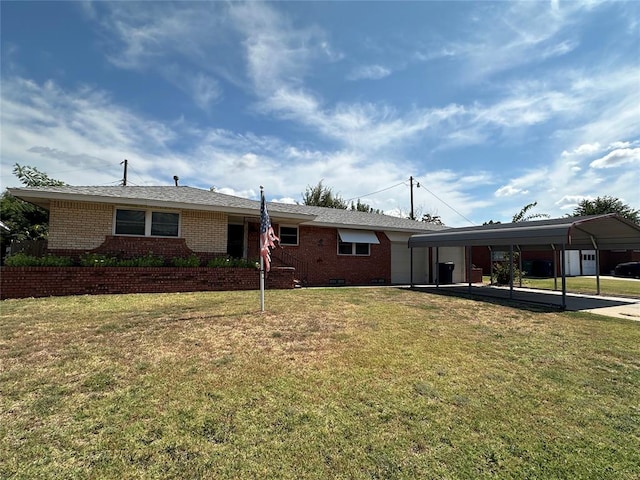 view of front of property with a front yard and a carport