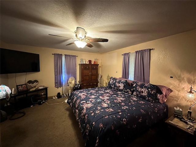 bedroom featuring carpet flooring, a textured ceiling, and ceiling fan