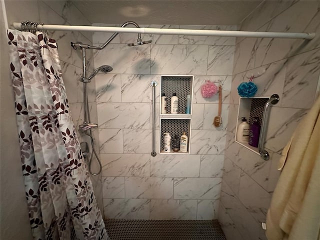 bathroom with a shower with shower curtain