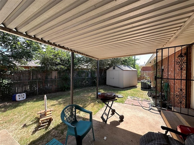 view of patio / terrace featuring a shed and central air condition unit