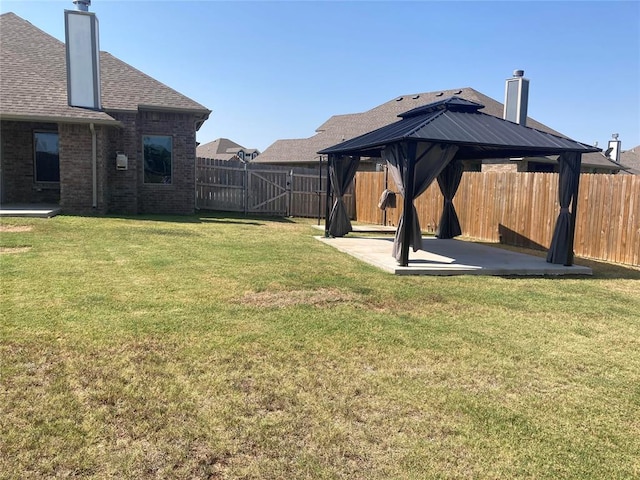 view of yard with a gazebo and a patio area