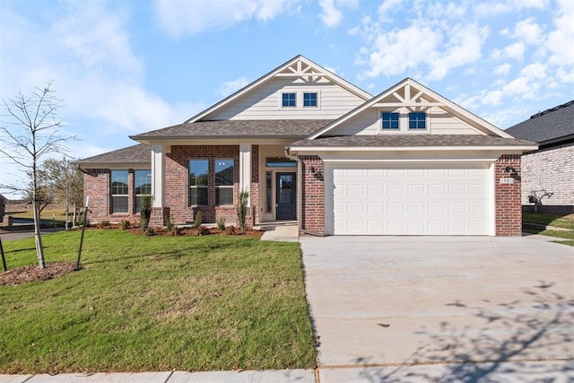 craftsman-style home with a garage and a front lawn