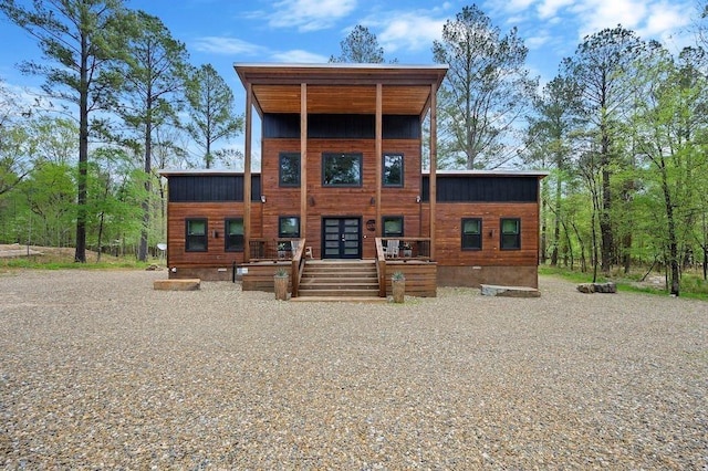 back of house featuring french doors