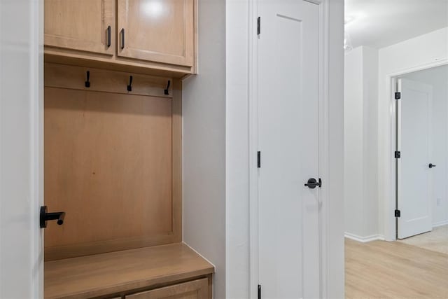 mudroom with light wood-type flooring