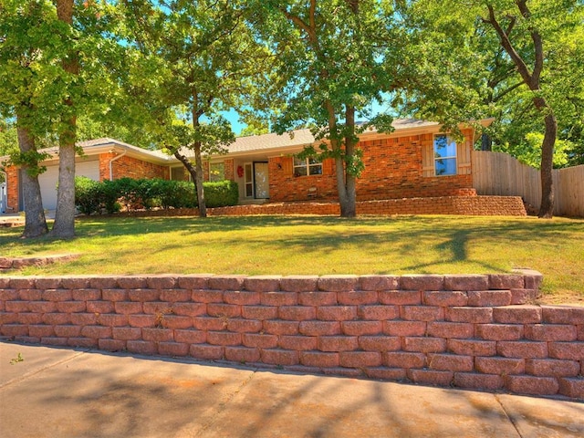 single story home with a front lawn