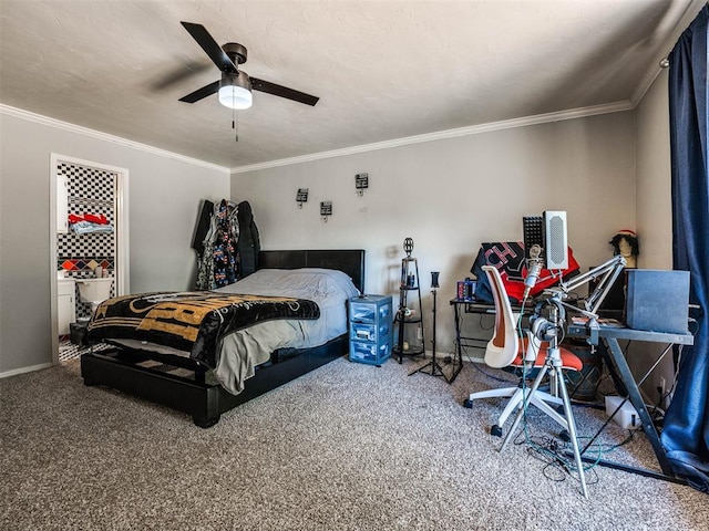 bedroom with ceiling fan, crown molding, and carpet floors